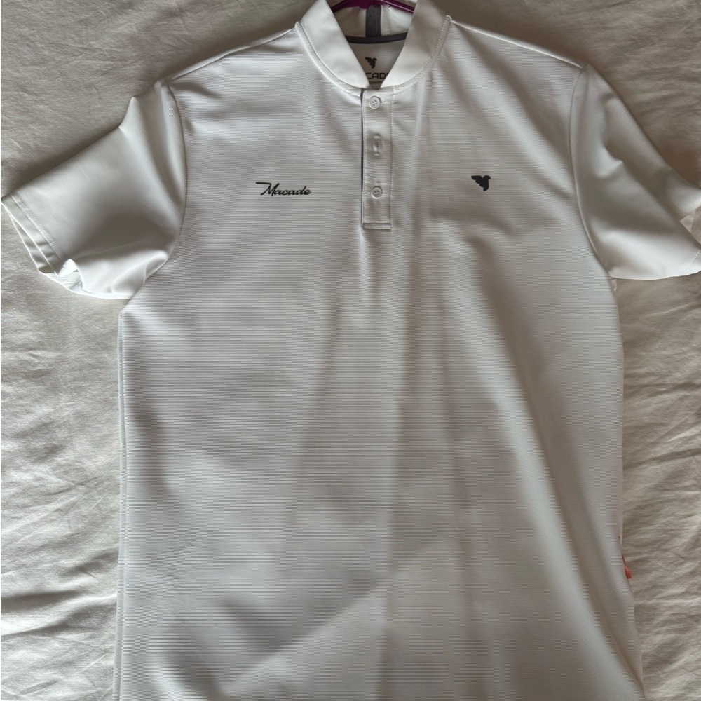 Like new men’s Macade golf shirt. Only worn once. Size M
